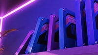 floppy disks on a shelf with a purple light